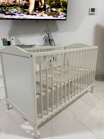 IKEA cot with new foam mattress