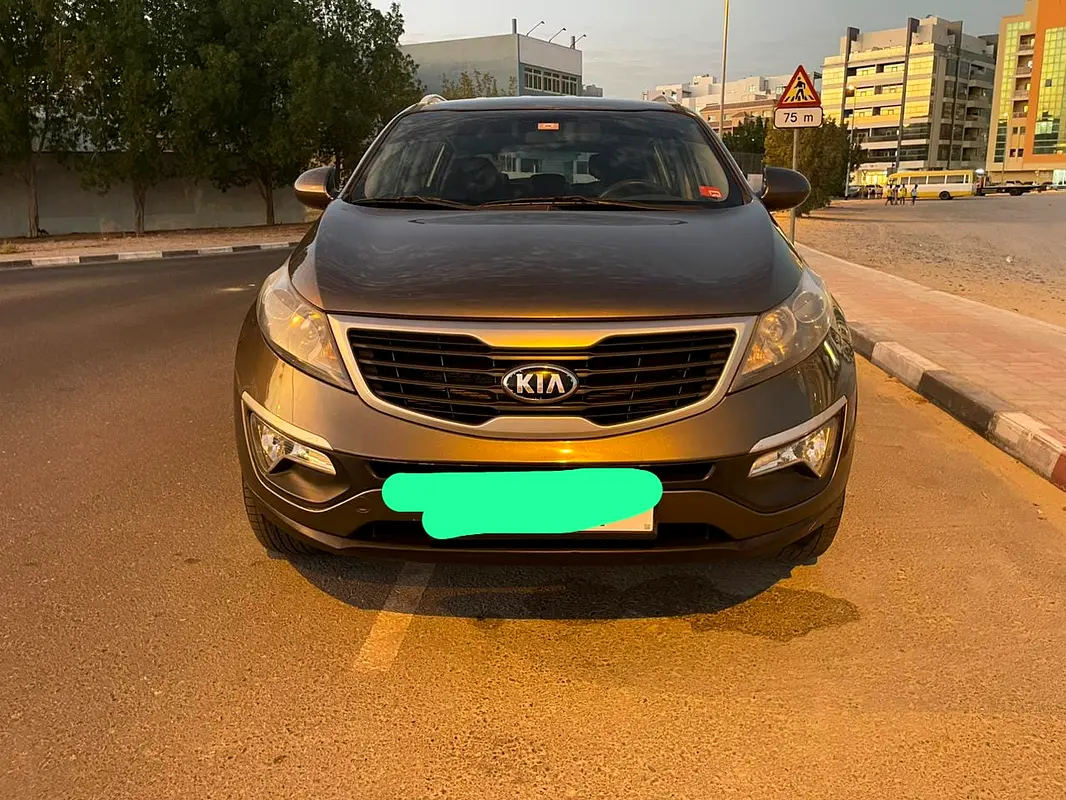 Kia Sportage 2014 — photo 1 of 14