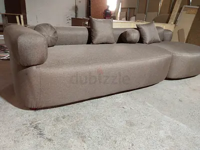 Modern low-profile 3-seater sofa with ottoman - beige fabric