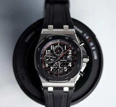 Mens stainless steel sports chronograph watch with black rubber strap
