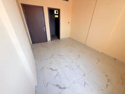 Annual rental apartment in Al Jurf 3, Ajman, behind the Chinese Market. Second-tenant two-bedroom apartment with a spacious living room and family-fri