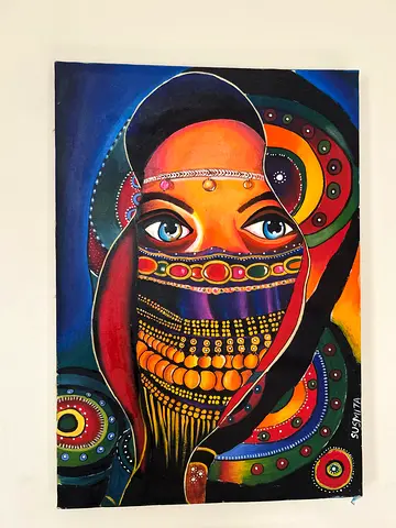 Hand-painted vibrant portrait of a veiled woman on canvas