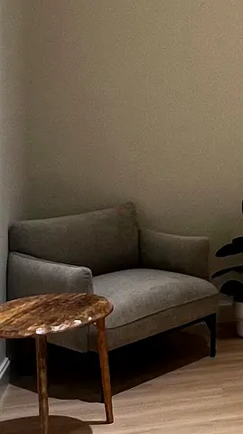 Modern single-seater accent chair in grey fabric from west elm