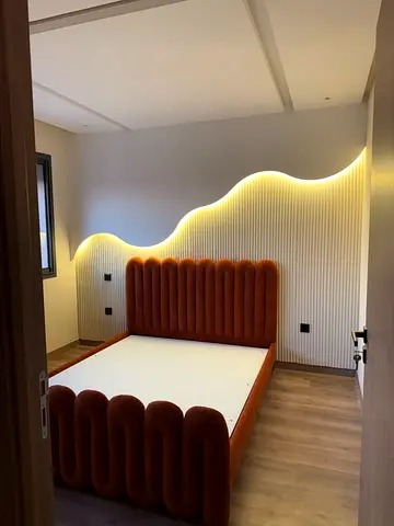 Modern Upholstered Bed Frame with Ribbed Headboard and Footboard