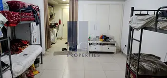 Rented Studio | Balcony | High ROI Investment | Motivated Seller