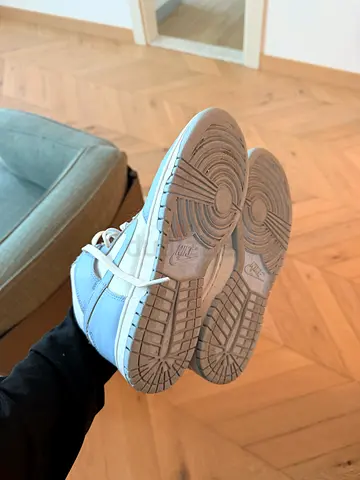 Light blue Nike sneakers, lightly used