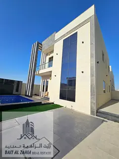 4 BHK Luxury villa with a swimming pool, including registration and ownership fees, located AL Zahiy