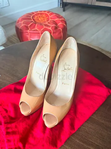 Authentic Christian Louboutin nude patent leather peep-toe heels, size 37.5.