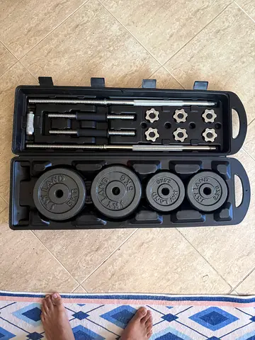 Portable Weights with barbell and dumbbell attachment.