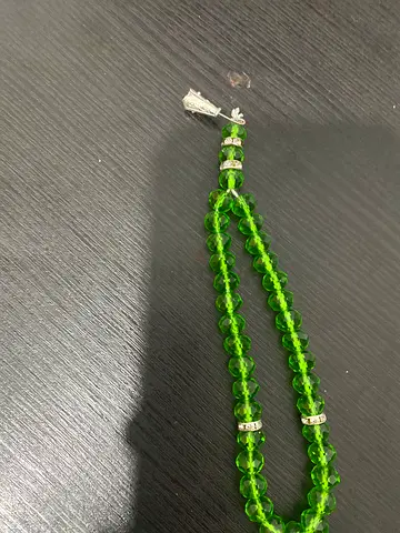 Green crystal prayer beads with silver accents