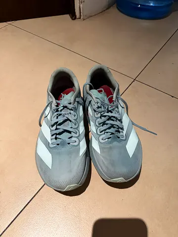 Grey athletic running shoes, lightly used