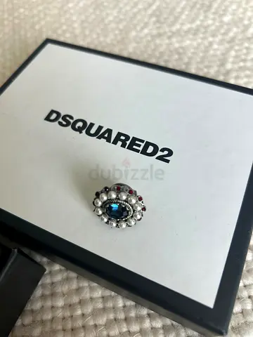 Vintage-style DSQUARED2 decorative earring / pin / brooch with blue center stone