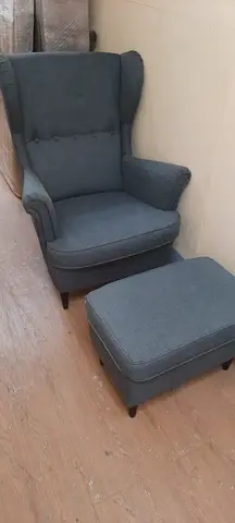 Black Sofa Chair with Bkack Foot Stool like new available for sale