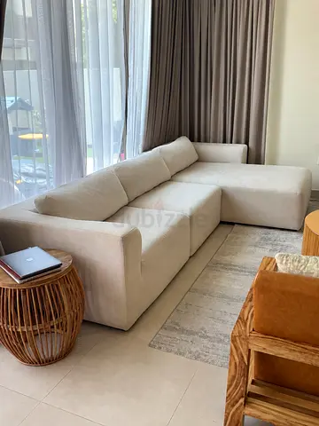 Light beige modular L-shaped sofa - comfortable, modern design