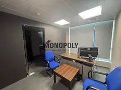 A fully furnished office in a prime location, ready for immediate occupancy, featuring luxurious fin
