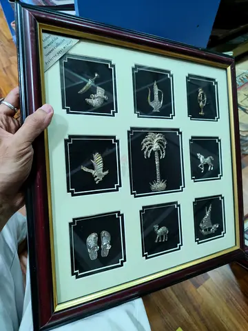 Framed Collection of 9 Silver Miniature Arabian-Themed Charms 38*38cm