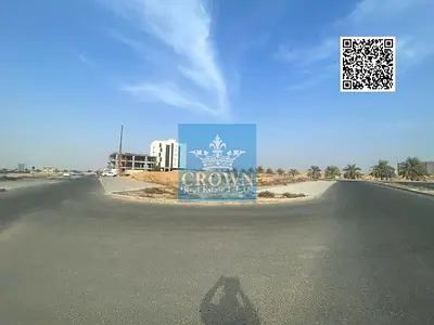 Corner Residential Commercial (G plus 5 ) Free Hold land in Global City Al Aalia Ajman