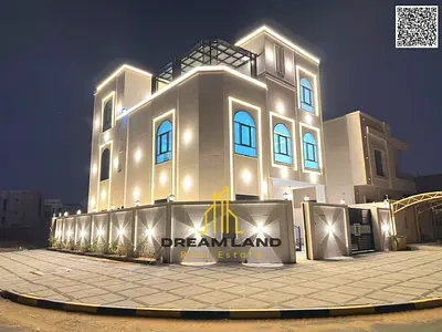 Direct from the owner, including all ownership fees: a villa in one of Ajman's most luxurious villas, built and finished to a super deluxe standard, w