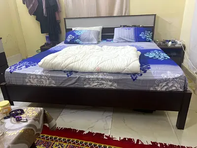 Queen size wooden bed frame with headboard - good condition with 2 side table