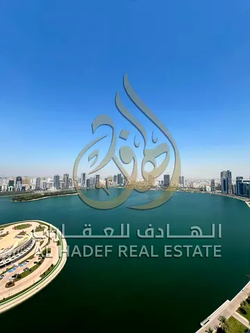 PALATIAL LUXURY WITH FULL OVERLOOK OF AL MAJAZ AMPHITHEATER - Massive 2 Bedrooms Plus Hall with 3 Balconies for Rent in Al Majaz 3, Sharjah 100% Unint