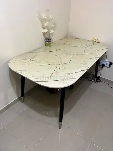 Marble-effect dining table with black legs - good condition