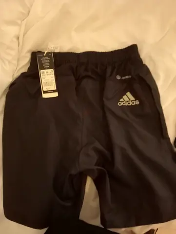 Addidas man short 35 dhs