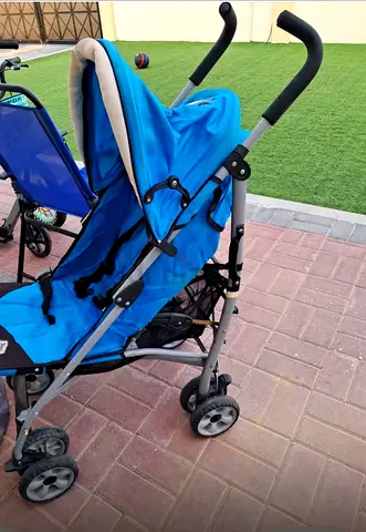 Lightweight blue umbrella stroller in good condition
