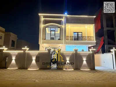 Direct from the owner, including all ownership fees: a villa in one of Ajman's most luxurious villas, built and finished to a super deluxe standard, w