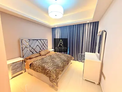 Two bedrooms and a living room in Gulf Tower with a swimming pool, gym and two free parking spaces