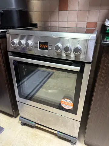 Stainless Steel Electric Oven with Four Burners - Good Working Condition