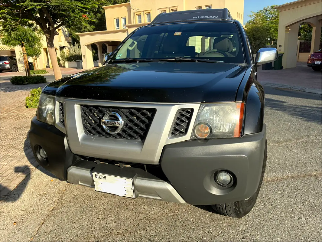 Nissan Xterra 2014 — photo 1 of 8