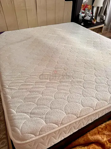 King size mattress in good used condition - comfortable support and semi medical
