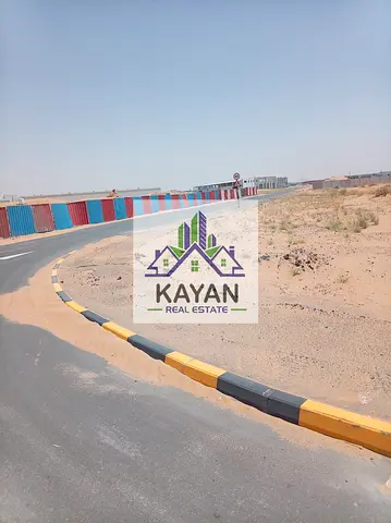 للبيع أرض صناعية زاوية 12,000 قدم² بأم الثعوب ، شارع رئيسي، تصريح أرضي وميزانين و2 طابق.