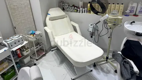Used adjustable beauty salon facial bed with steamer and trolley