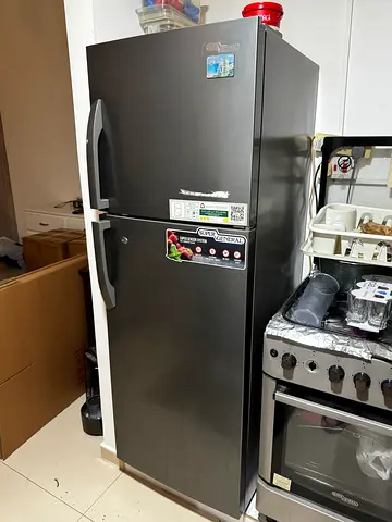 Used double-door refrigerator in good working condition