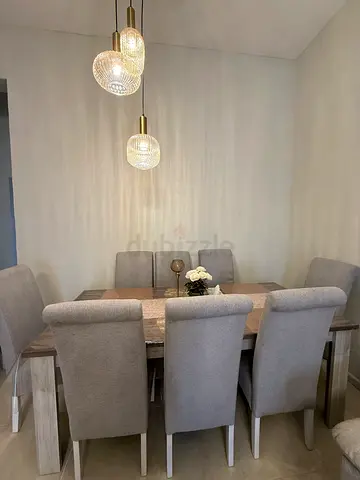 Wooden Dining Table with 8 Grey Chairs - Good Condition