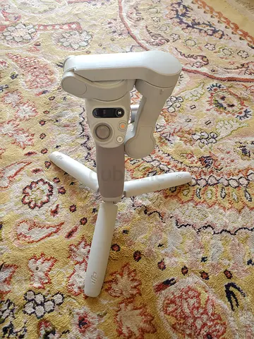 DJI Osmo Mobile Series Gimbal with Mini Tripod - Light Grey, Good Condition