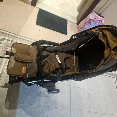 Lightweight brown single stroller in good used condition