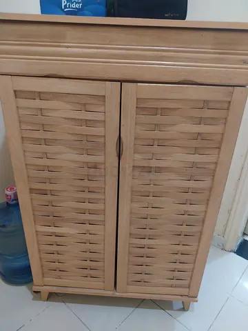 Light wood woven-design cabinet / cupboard - good condition
