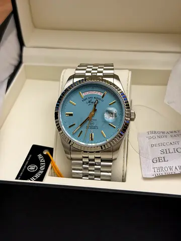 West End Watch Co. mens stainless steel automatic watch with blue dial (with box)