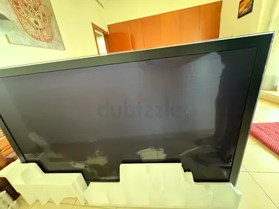 65’’ flat screen TV - good condition