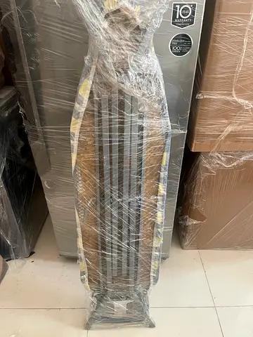 Ironing board (foldable) - like new, still wrapped