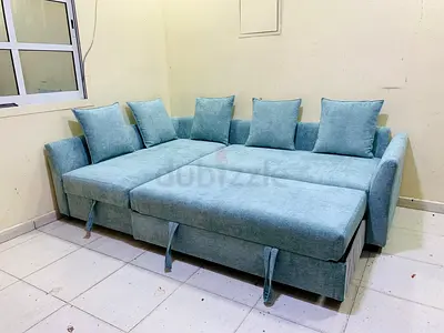 Light blue fabric 3-seater sofa bed with storage - good condition