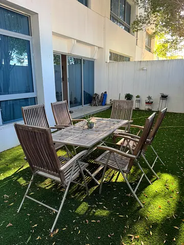 Outdoor teak dining table with 6 chairs - excellent condition