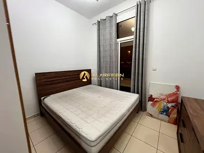 2BR | Burj Sabah JVC | Multiple Balconies | Community & Street Views