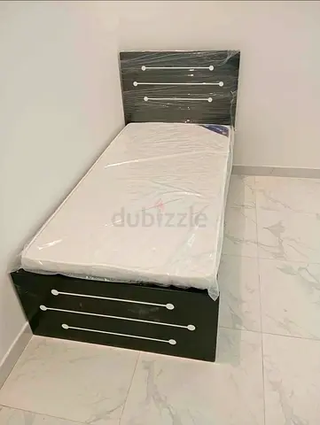 BRAND NEW SINGLE WOOD BED WITH MATTRESS AVAILABLE