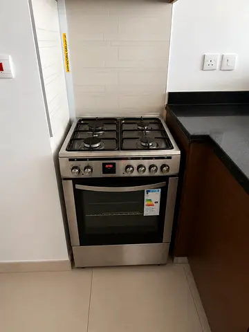 Stainless steel freestanding electric cooker with oven - good condition