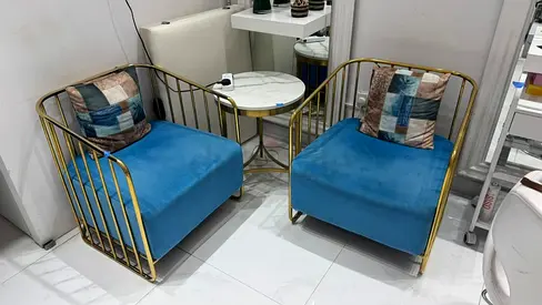 Pair of Blue Velvet Accent Chairs with Gold Frame and Side Table