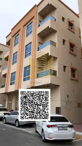 Building for sale in Ajman, Al Alia area. 5 years old. Land area: 287 sq m (3094 sq ft). Consists of 14 units: 9 one-bedroom apartments, 2 studios, and 3 shops. The building boasts a prime location an