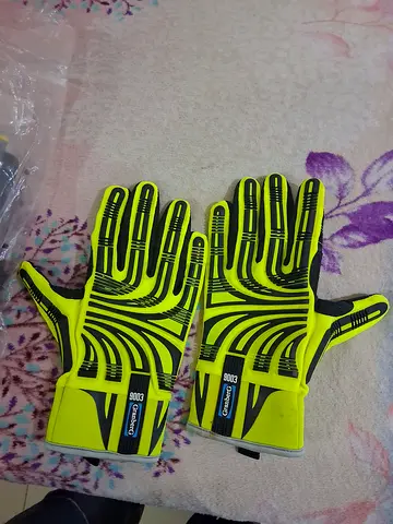 Pair of neon yellow goalkeeper gloves -Granberg 9003 and 2 extra pair of untouched gloves